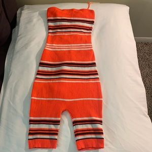 Multicolored romper w/ the back out.